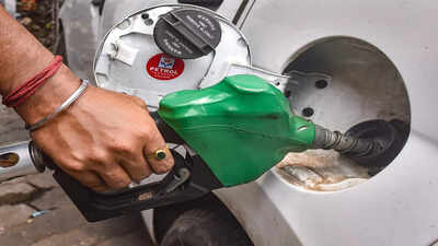 kolkata a pump attandant fills petrol in a car at a refilling station as petrol