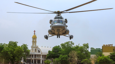 an iaf helicopter carrying sealed neet ug retest question paper packets at the armed reserve police ground in tirunelveli district tamil nadu on wednesday pti