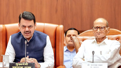 maharashtra chief minister devendra fadnavis with sharad pawar