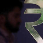 1787028986 rupee weakens against us dollar