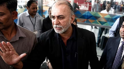 1787068946 tarun tejpal
