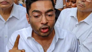 guards scuffle with police as officials remove billboard from abhishek bannerjees kolkata office