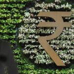 rupee slips against us dollar