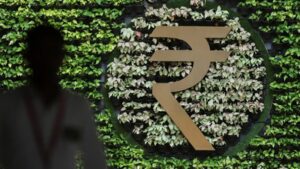rupee slips against us dollar