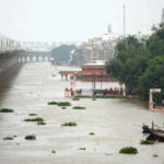 a view of riverside ghats submerged amid the rise in ganga