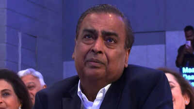 mukesh ambani gets emotional while listening to anant and isha ambanis address during jio platforms ipo ceremony
