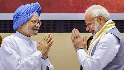 pm modi and former pm manmohan singh file photo