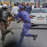 security personell nabbing protester during cjp protest
